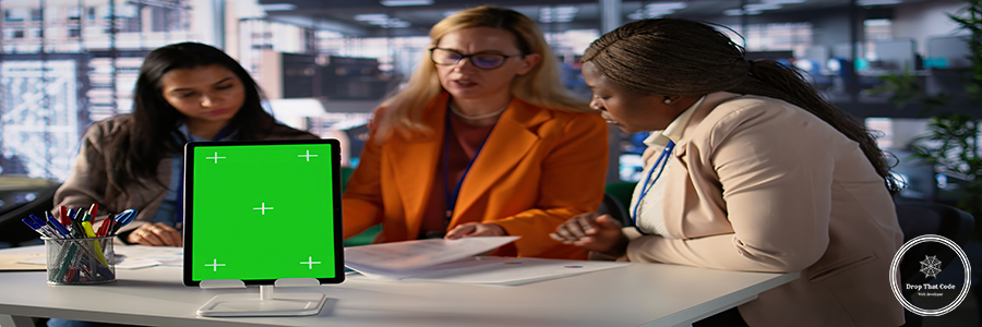 Entrepreneurs team with a success story work next to green screen Entrepreneurs team with a success story work next to green screen, using professional tools to meet project deadline and obtain business growth. Leadership skills and professionalism. Camera B.