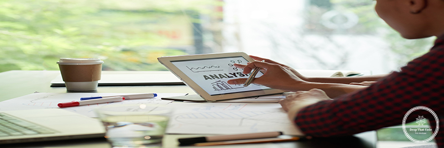 Examining analysis Business executive reading analysis on her digital tablet