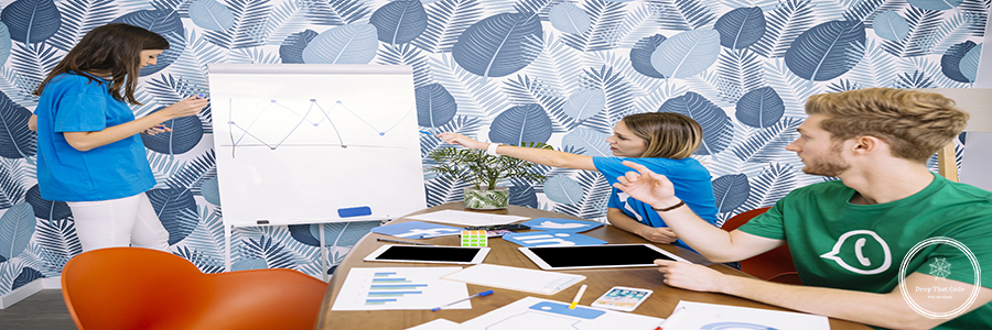 social-media-team-discussing-graph-workplace
