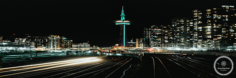 illuminated-city-buildings-night illuminated-city-buildings-night