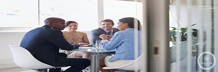 This meeting is going well. Shot of a group of businesspeople ha Shot of a group of businesspeople having a meeting in a boardroom.
