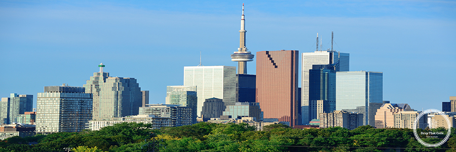 Toronto skyline Toronto skyline over park with urban buildings and blue sky