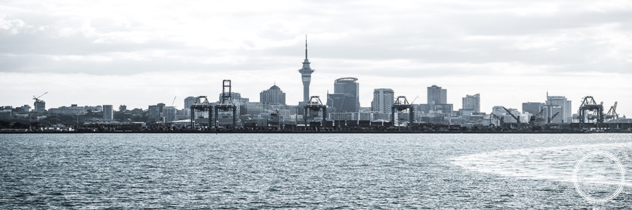 city-waterfront-against-cloudy-sky city-waterfront-against-cloudy-sky